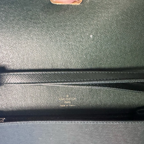 Louis Vuitton Tiaga Leather Clutch - Picture 6 of 12